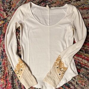 Free People white and gold womens top with scoop neck.